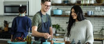 Friends cooking in the kitchen